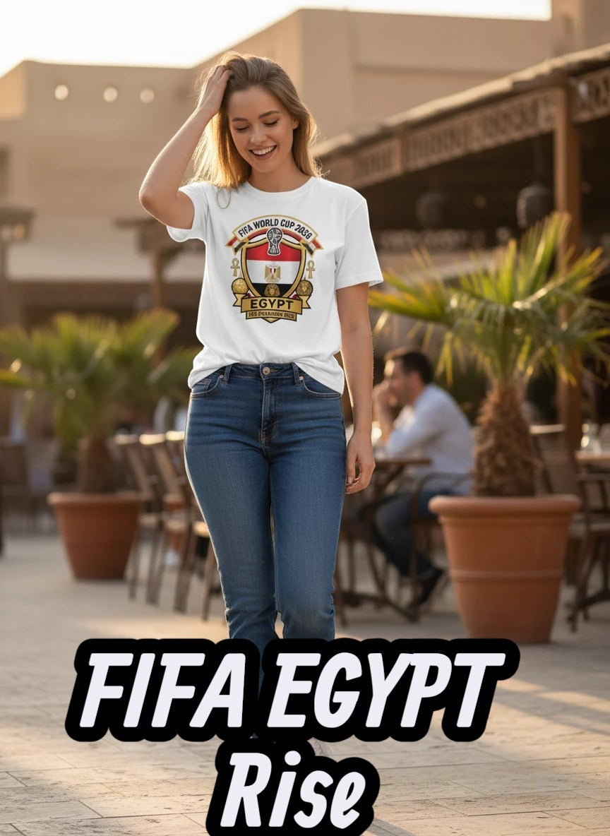 White cotton t-shirt with Egypt FIFA World Cup 2038 graphic crest, short sleeves, crew neck. Model is wearing jeans.