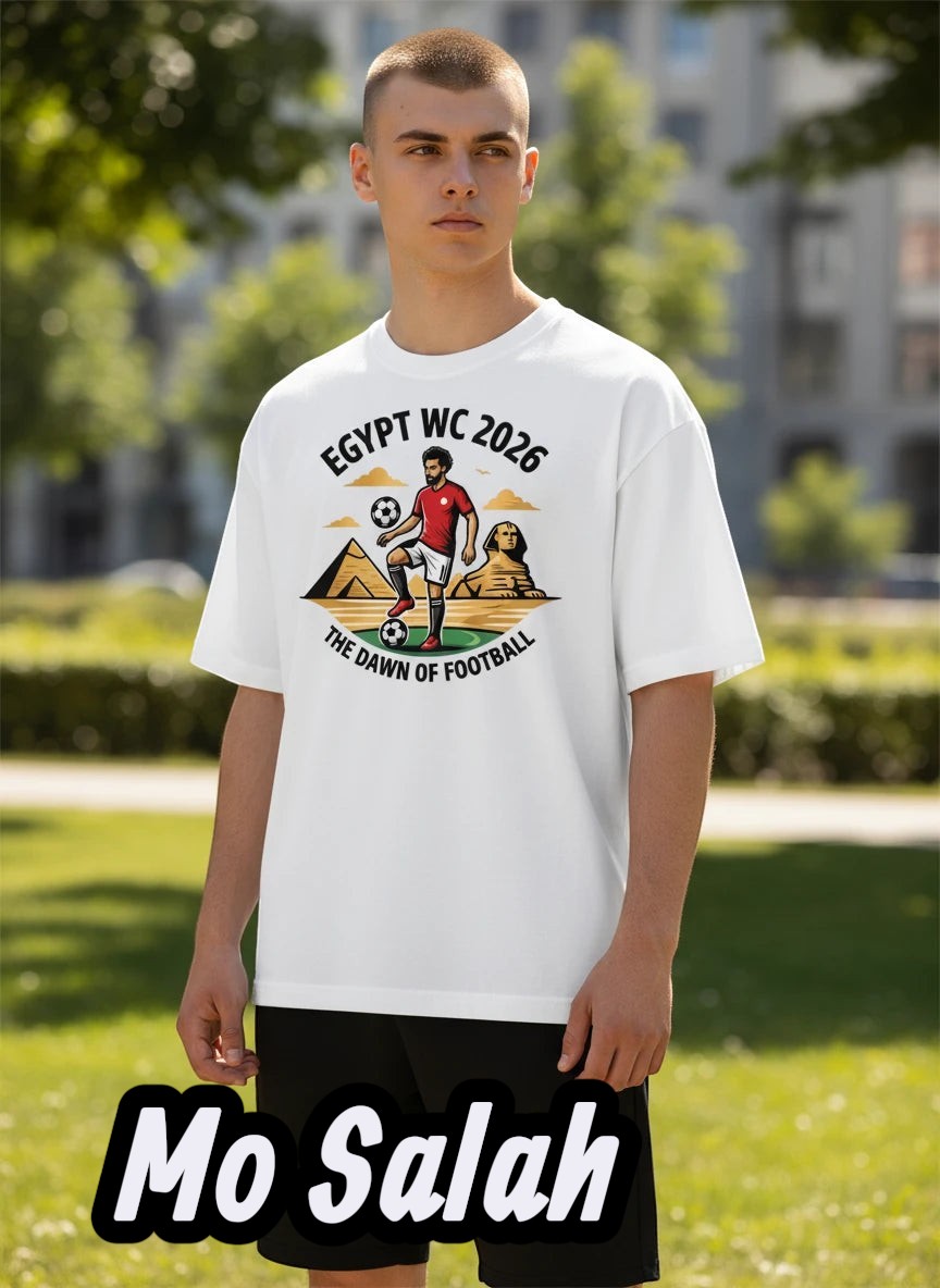 Coptic Mary Shop white cotton graphic t-shirt with Egypt WC 2026 and football player graphic