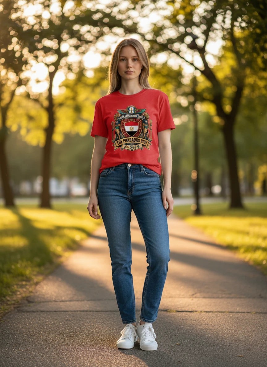 Coptic Mary Shop red cotton t-shirt with Egypt national football team crest and "The Pharaohs Rise" text.