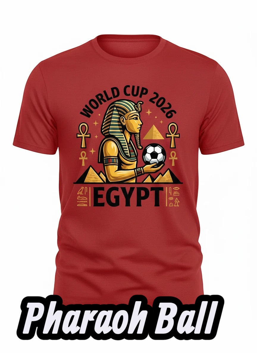 Coptic Mary Shop red cotton t-shirt with World Cup 2026 Egypt graphic featuring pharaoh and football.