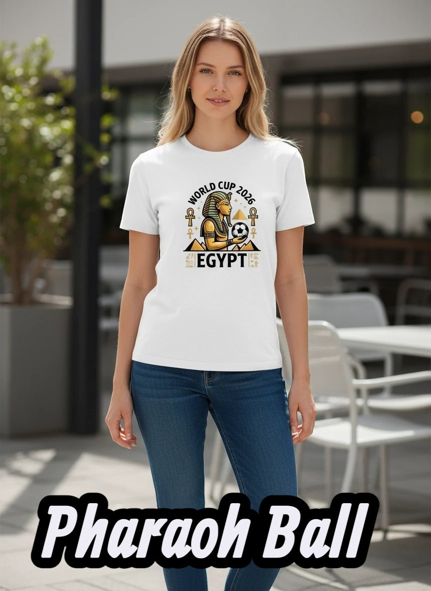 Coptic Mary Shop white cotton t-shirt with World Cup 2026 Egypt graphic featuring a pharaoh holding a soccer ball.