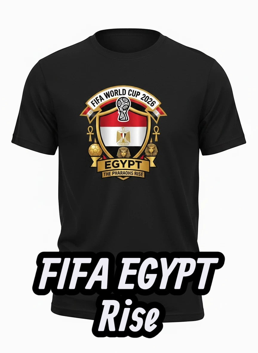 Coptic Mary Shop black cotton t-shirt with Egypt FIFA World Cup 2026 graphic featuring the Egyptian flag and "The Pharaohs Rise" slogan.