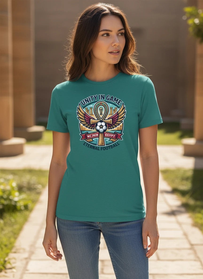 Coptic Mary Shop teal cotton t-shirt with Egypt 2026 World Cup football graphic featuring an ankh and wings.